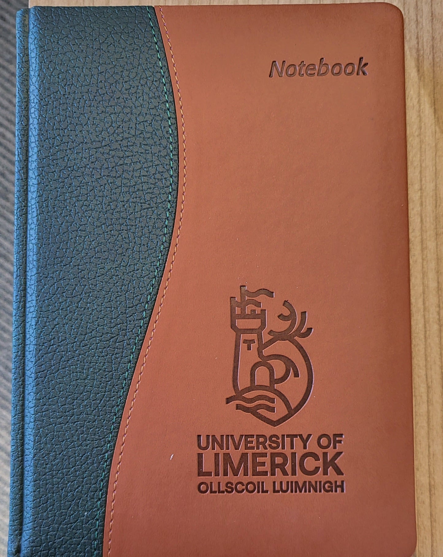 Notebook, Dual Tone Leather in green and tan. UL logo debossed.